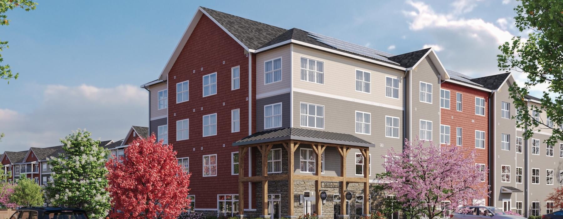 a large brick building with a parking lot in front of it